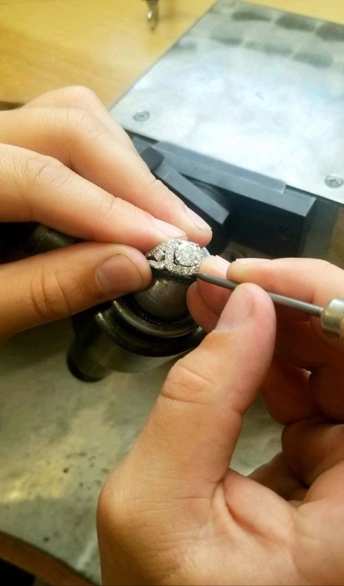 Close-up of a jeweler working on a ring